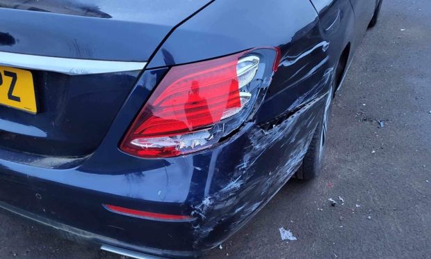 The parked car that was damaged in the crash. Image: Supplied