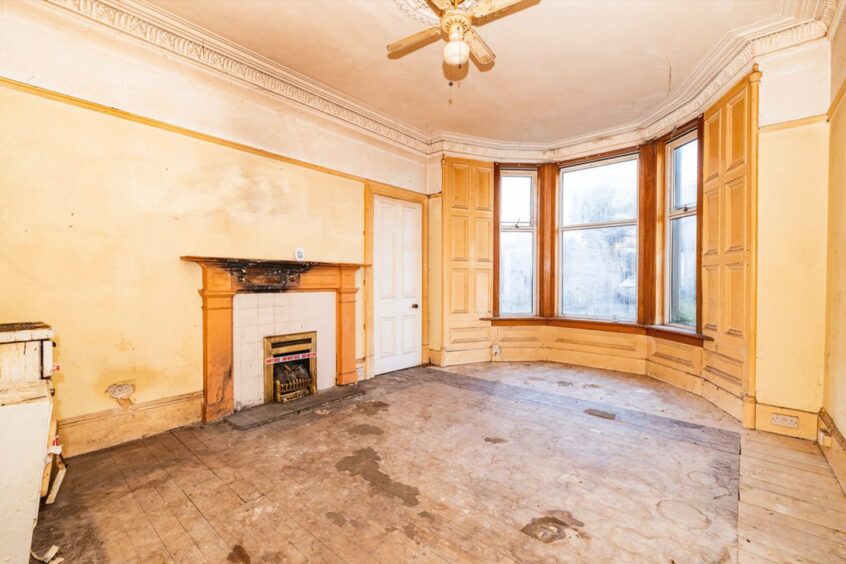 livign room at the Dundee flat in need of extensive renovations 