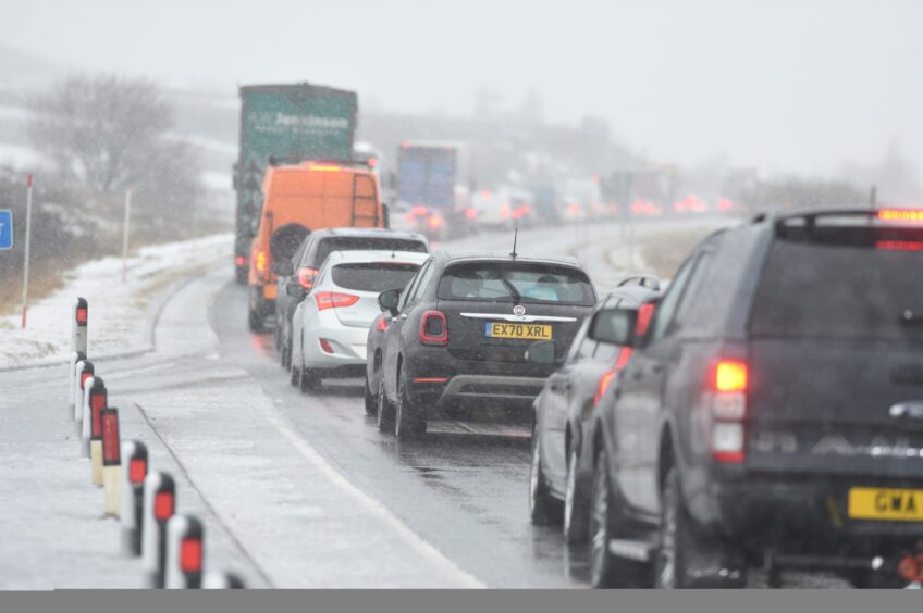 Line if traffic in snow on A9 during Storm Gerrit
