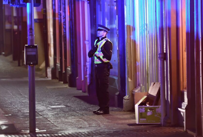 A police officer at the scene.