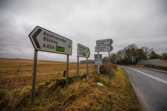 Signs at side of road near Auchterarder where new Shinafoot slip road is planned