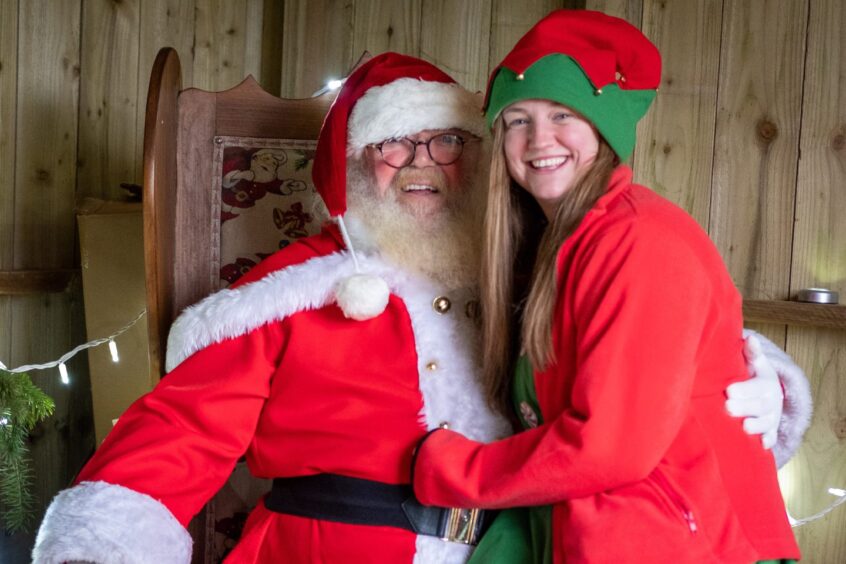 Santa and his elf at the Scottish Deer Centre Christmas grotto