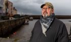 Marine archaeologist and ship wreck hunter Neil Cunningham Dobson at St Andrews Harbour.