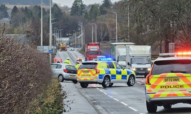 To go with story by Stephen Eighteen. Emergency services on the A94 between Perth and Scone.