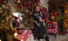 Flo and Paul Gebara in their Christmas home.