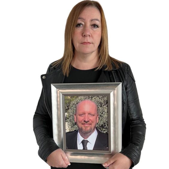 Tracey Marsh with picture of tragic Jon