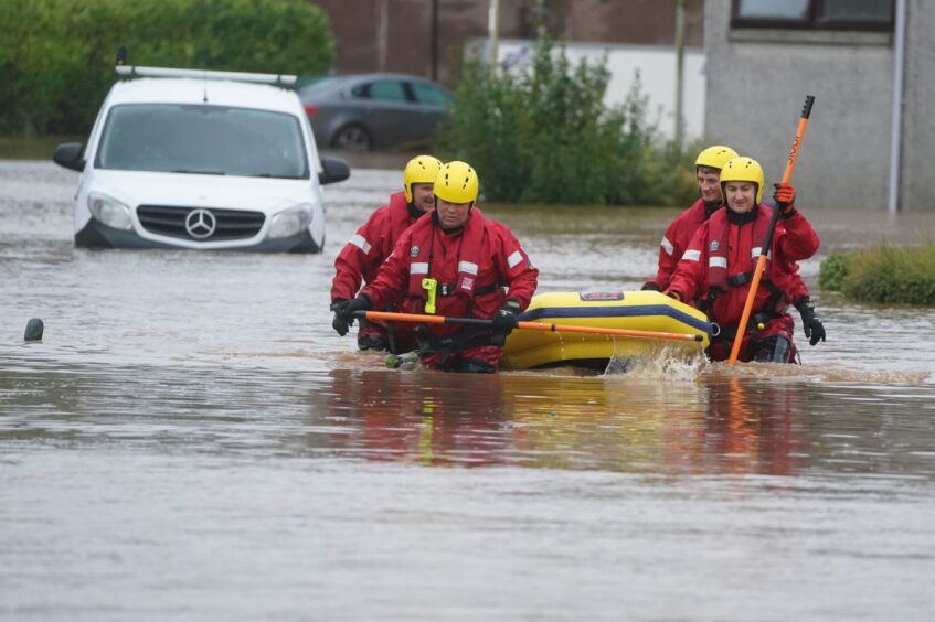 Members of a Coastguard Rescue Team in Brechin during Storm Babet.