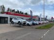 Cars sitting outside Fiskens garage in Forfar.