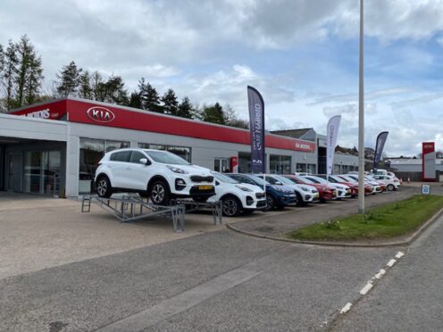 Cars sitting outside Fiskens garage in Forfar.