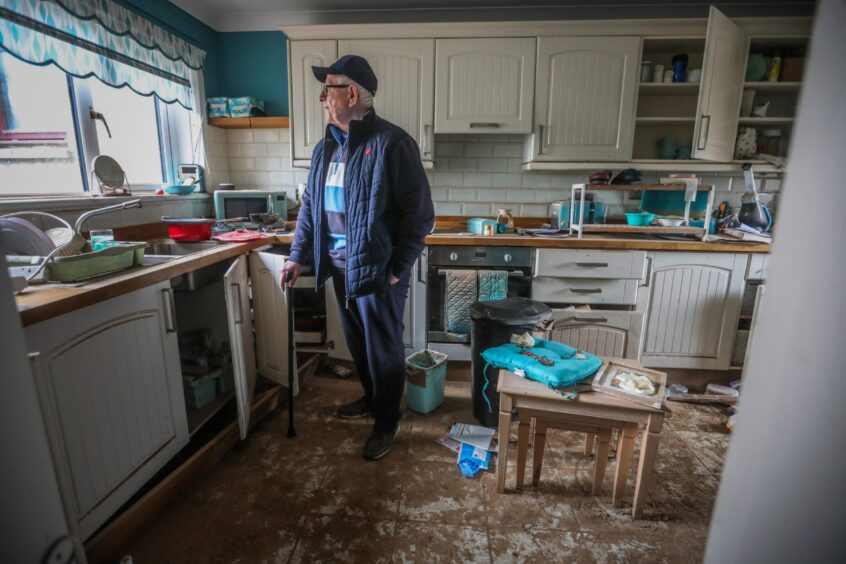 Ian Stewart in the kitchen of his flooded River Street home in Brechin.