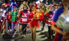 A parade during the Perth Christmas lights turn on in 2023.