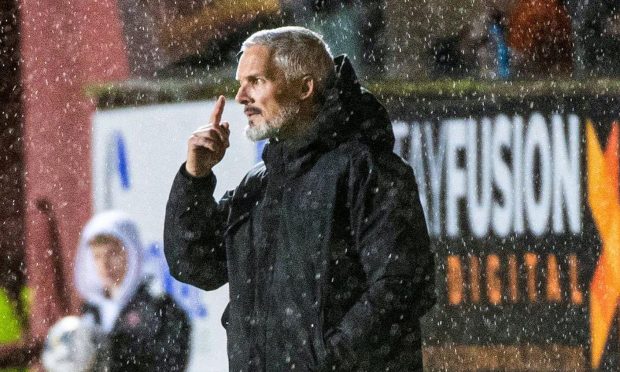 Dundee United boss Jim Goodwin is maintaining a sense of perspective. Image: SNS.