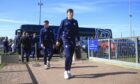 Charlie Reilly arrives with the Dundee team at McDiarmid Park. Image: Shutterstock/David Young