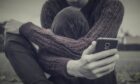 Support can be found through NHS Tayside, on phone apps and drop-in centres locally. Image: Shutterstock.