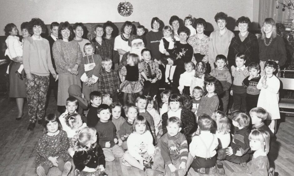 The Tumble Tots enjoying their Christmas party in 1991.