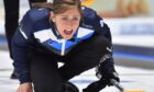 Eve Muirhead in curling action during a competition