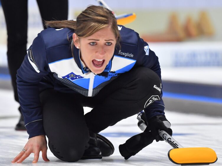 Eve Muirhead in curling action during a competition