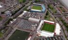 Tannadice Park and Dens Park, seen in an aerial shot, remain side by side in Dundee's Dens Road.
