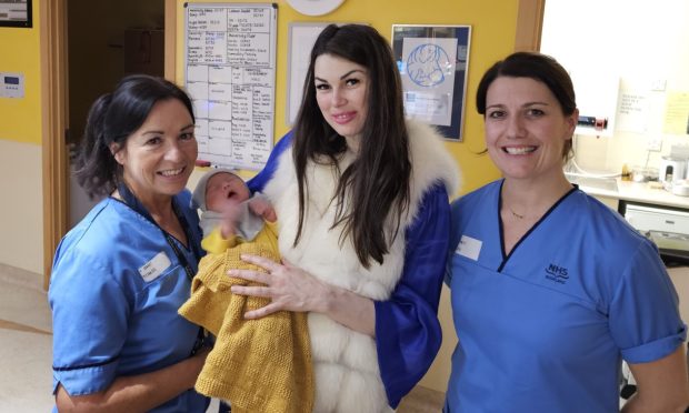 Doina Solomeanii with baby Mark and nurses at Ninewells on January 1 2024.