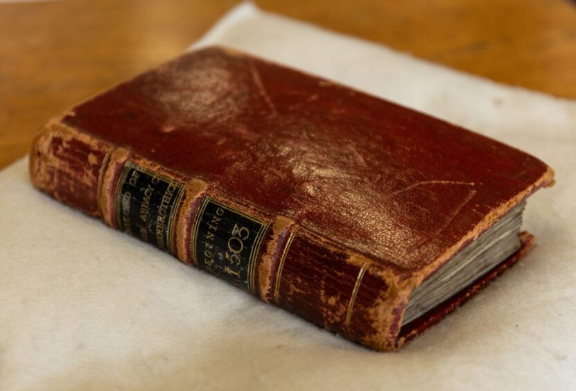 an old leatherbound book
