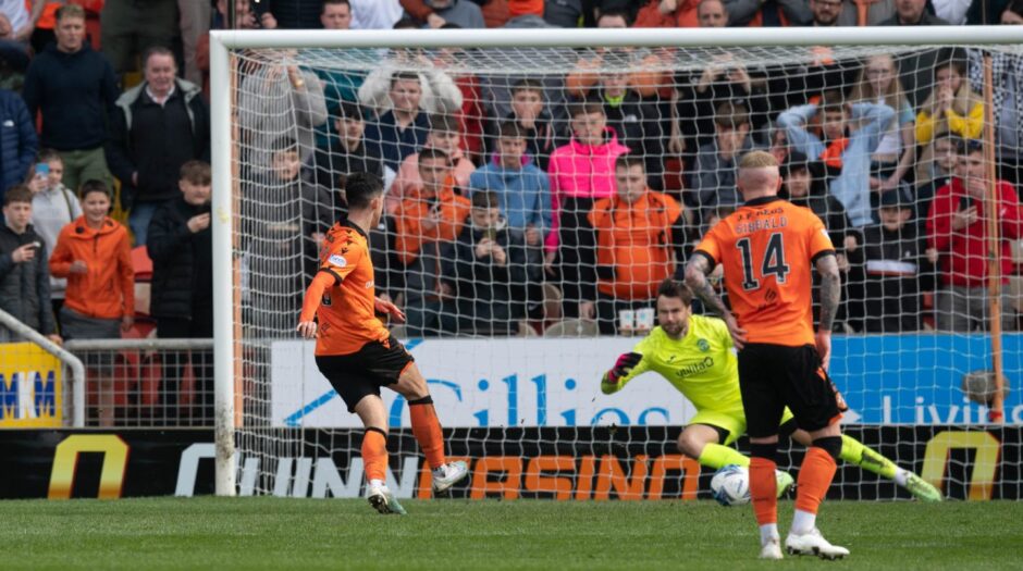 Jamie McGrath scores a 90th minute penalty against Hibs at Tannadice.