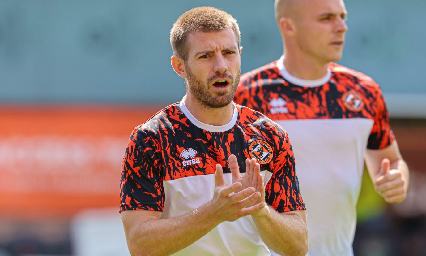Ross Docherty warming up for Dundee United.