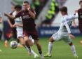 Connor Smith in action for Hearts last summer as he battles for the ball with two Leeds United opponents in a pre-season friendly.