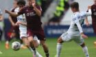 Connor Smith in action for Hearts last summer as he battles for the ball with two Leeds United opponents in a pre-season friendly.