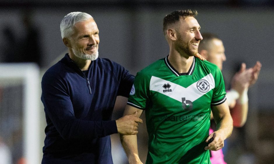 Dundee United manager Jim Goodwin and striker Louis Moult