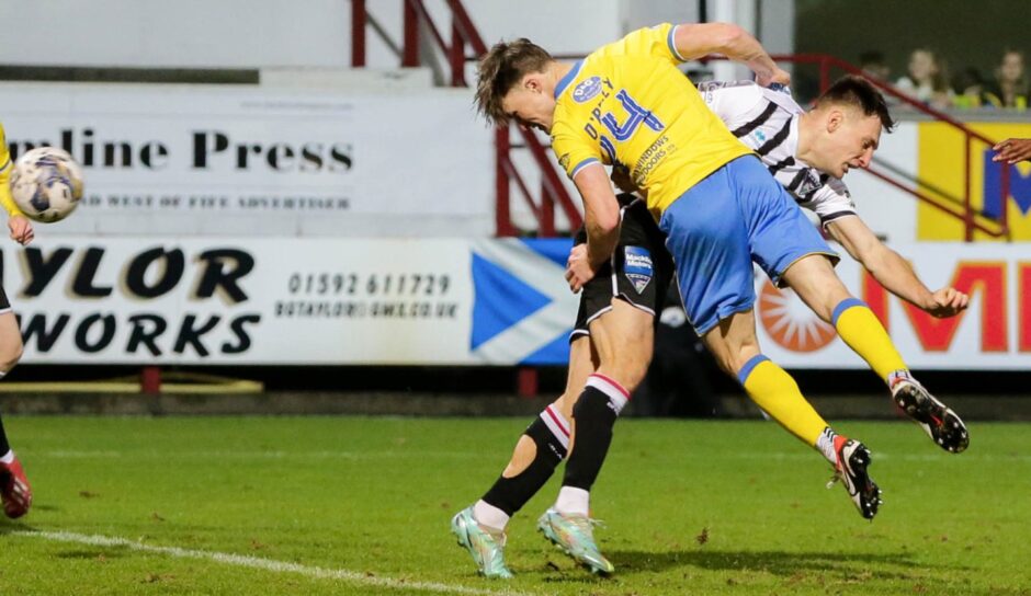 Raith Rovers defender Dan O'Reilly beats Dunfermline Athletic counterpart Josh Edwards to the ball to nod in the winning goal in the Fife derby at East End Park. Image: Ewan Bootman / SNS Group.
