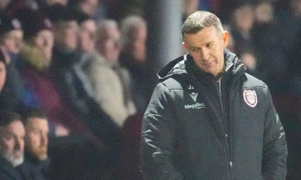 Jim McIntyre watches Arbroath lose 3-0 against Dundee United