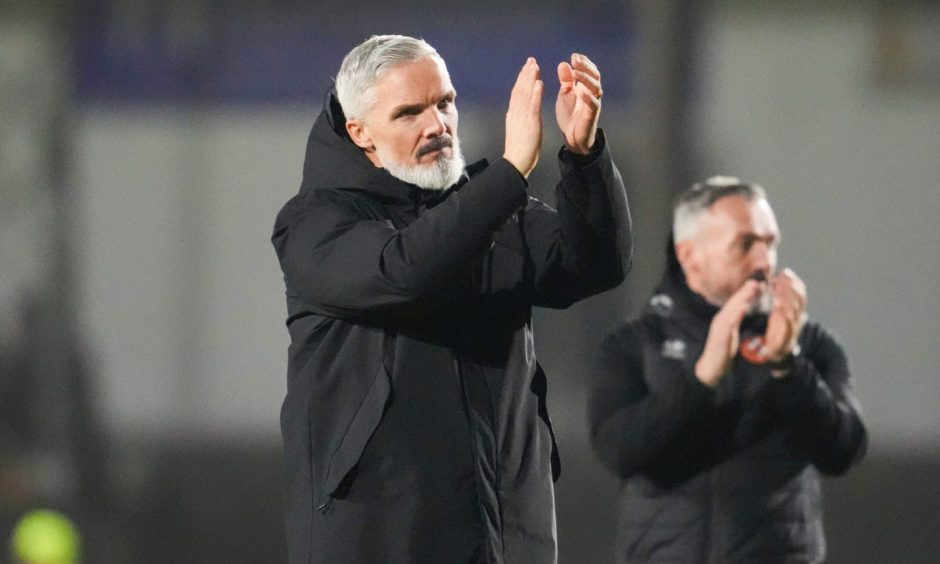 Jim Goodwin salutes the Dundee United fans