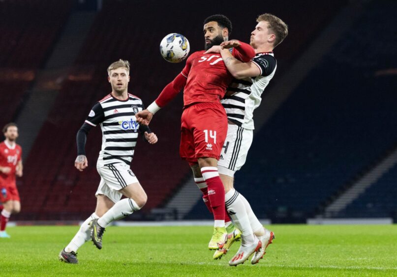 Alex Jakubiak tussles with a Queen's Park defender during Dunfermline Athletic F.C.'s 2-1 defeat at Hampden in January.
