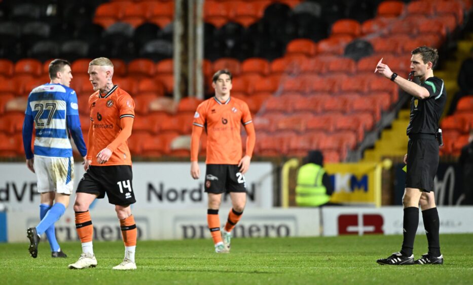 Dundee United's Craig Sibbald makes the long walks after his red card against Morton