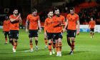 Disappointed Dundee United players trudge off at full-time against Morton