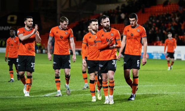 Disappointed Dundee United players trudge off at full-time against Morton
