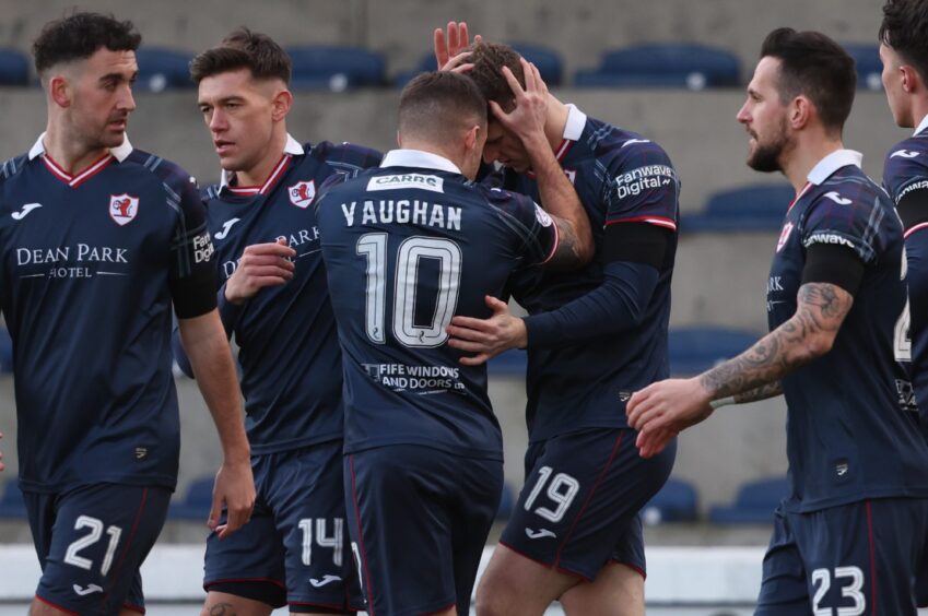Raith's Jack Hamilton celebrates with Lewis Vaughan as he scores to make it 1-0 for Raith Rovers. Image: Ross MacDonald / SNS Group.