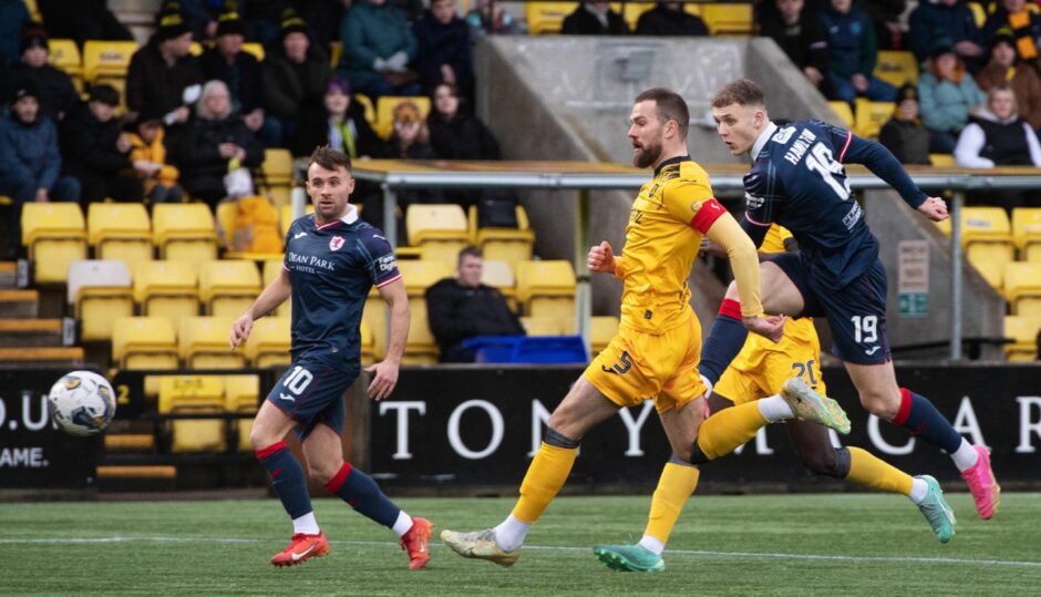 Jack Hamilton shoots at goal to five Raith Rovers an early opening goal against Livingston. Image: Sammy Turner / SNS Group.