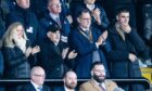 Dundee managing director John Nelms was joined by Burnley chairman Alan Pace in the stands at Livingston. Image: SNS