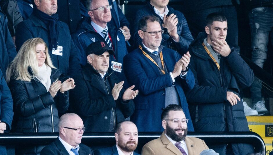 Dundee managing director John Nelms was joined by Burnley chairman Alan Pace in the stands at Livingston. Image: SNS