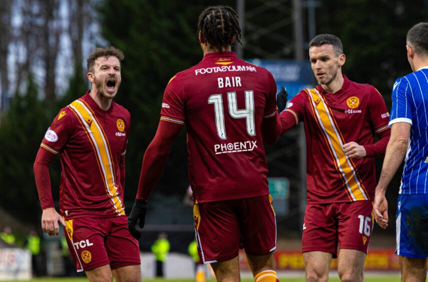 Motherwell's Theo Bair celebrates with his team-mates. 