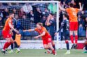 Inverness Caley Thistle striker Alex Samuel wheels away after scoring his second against Raith Rovers.