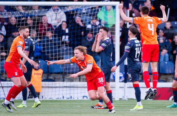 Inverness Caley Thistle striker Alex Samuel wheels away after scoring his second against Raith Rovers.