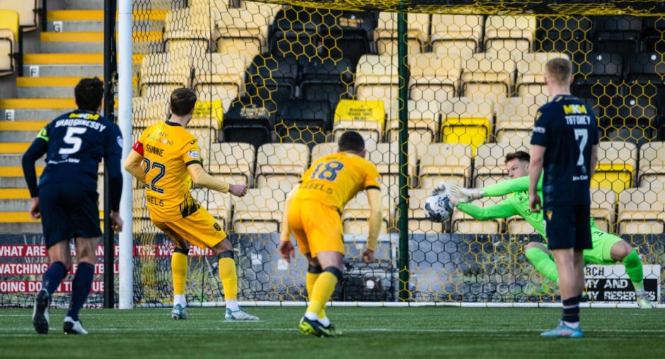 Harry Sharp saves Andrew Shinnie's penalty. Image: SNS