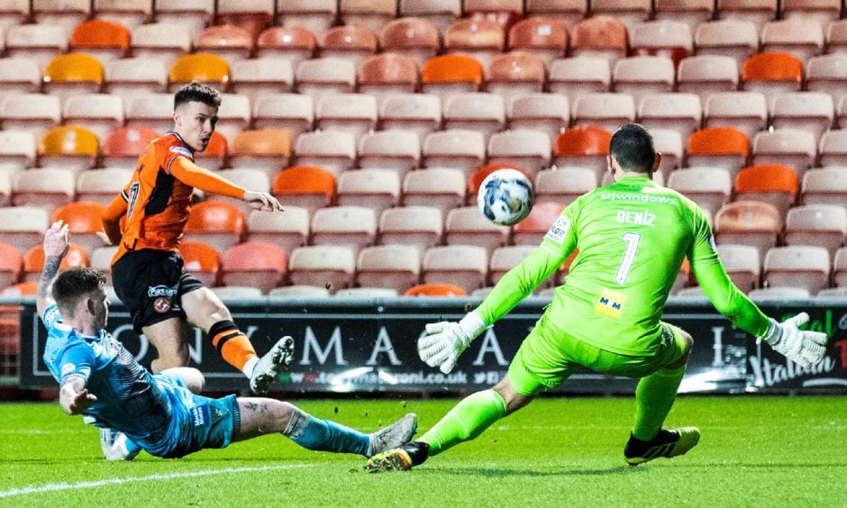 Dundee United's Archie Meekison is denied against Dunfermline