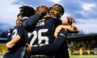 Dundee celebrate at Livingston. Image: SNS