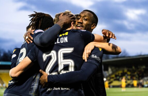 Dundee celebrate at Livingston. Image: SNS