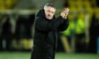 Tony Docherty applauds Dundee fans after winning at Livingston. Image: SNS