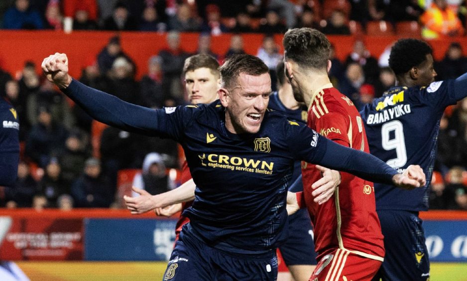 Lee Ashcroft celebrates scoring for Dundee against Aberdeen last month.