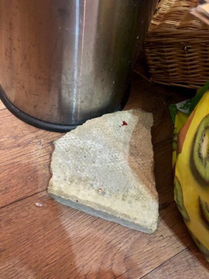A stone left behind after a break-in at Johnnie Orange Cafe in Perth.